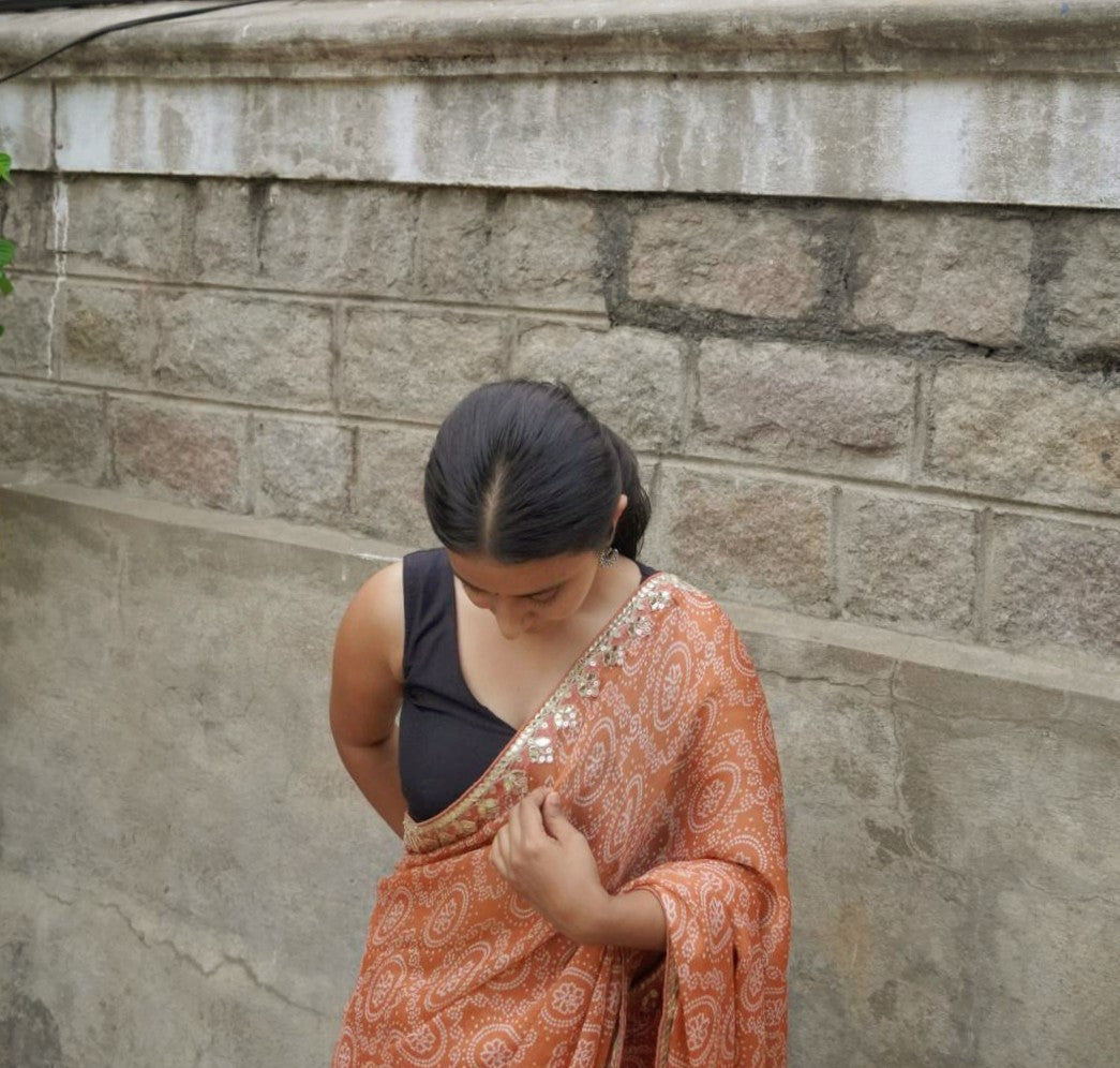 Rust orange Bandhani Saree