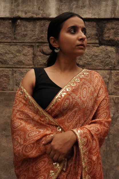 Rust orange Bandhani Saree